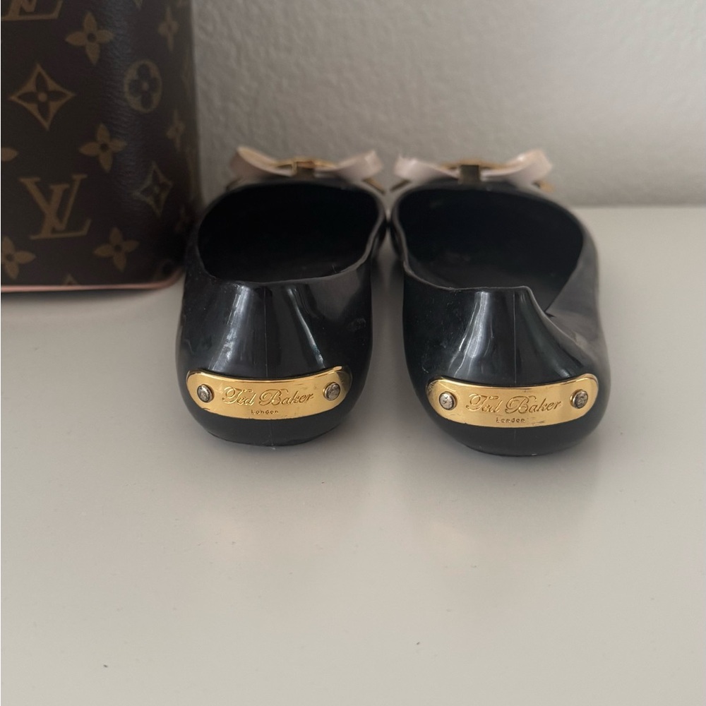 Ted Baker London Black and Gold Flats with Elegant Bow - Picture 3 of 6
